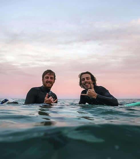 thebaliboardinghouse-two-surfers-in-water